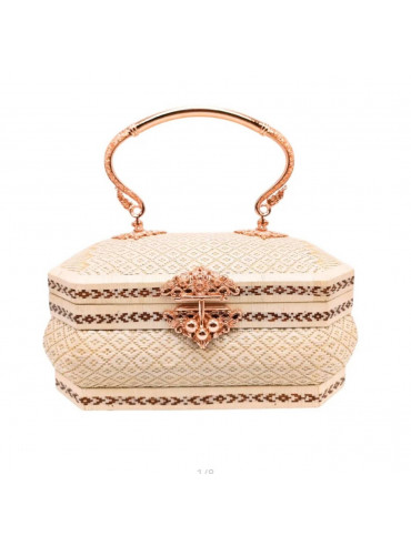 ivory, gold handle