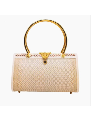 ivory, gold handle